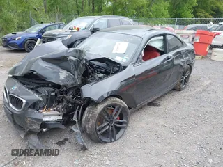 2016 BMW 2 Series 228i xDrive z VIN WBA1G9C52GV598422, wystawiony jako IAAI lot #42309718 z przebiegiem 142 682 mil mil oraz . Historia ofert i sprzedaży dostępna na DreamBid. Obrazek 2.