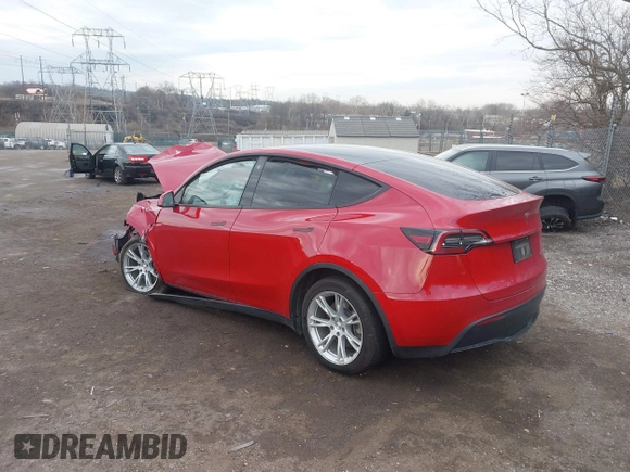 2022 Tesla Model Y Long Range with VIN 7SAYGDEE1NF442159, listed as a IAAI auction lot 41674506 with 82,355 mi miles and . Bid and sale history available at DreamBid. Image 3.