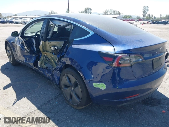 2020 Tesla Model 3 Standard Range Plus with VIN 5YJ3E1EA1LF590396, listed as a IAAI auction lot 41868089 with 51,278 mi miles. Bid and sale history available at carsss.com. Image 3.