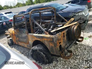 1990 Jeep Wrangler "S" with VIN 2J4FY19E7LJ539189, listed as a Copart auction lot 68790934 with 0 mi miles and Non Repairable. Bid and sale history available at carsss.com. Image 2.