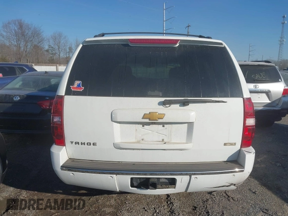 2010 Chevrolet Tahoe LTZ with VIN 1GNUKCE01AR197786, listed as a IAAI auction lot 41659828 with 288,151 mi miles and . Bid and sale history available at DreamBid. Image 16.