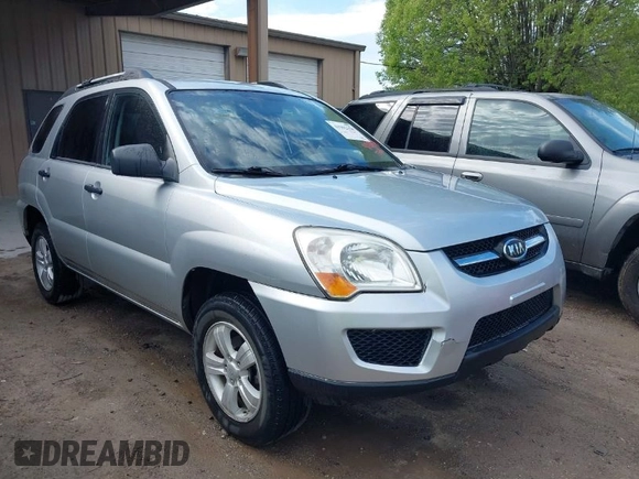 2009 Kia Sportage LX with VIN KNDJF724397572311, listed as a IAAI auction lot 41902158 with 120,899 mi miles and . Bid and sale history available at carsss.com. Image 1.