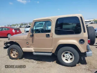 1999 Jeep Wrangler Sahara with VIN 1J4FY49S8XP462512, listed as a IAAI auction lot 42165052 with 146,135 mi miles and . Bid and sale history available at DreamBid. Image 15.