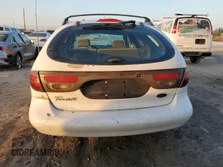 1999 Ford Taurus SE z VIN 1FAFP58S3XG308764, wystawiony jako Copart lot #43959225 z przebiegiem 120 936 mil mil oraz Szkoda całkowita • Salvage title. Historia ofert i sprzedaży dostępna na DreamBid. Obrazek 6.