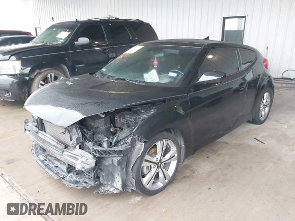 2017 Hyundai Veloster Value Edition with VIN KMHTC6AD6HU321999, listed as a IAAI auction lot 41611017 with 99,382 mi miles. Bid and sale history available at carsss.com. Image 17.