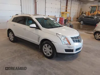 2010 Cadillac SRX Luxury Collection with VIN 3GYFNDEY8AS540220, listed as a IAAI auction lot 42128036 with 185,845 mi miles. Bid and sale history available at carsss.com. Image 1.