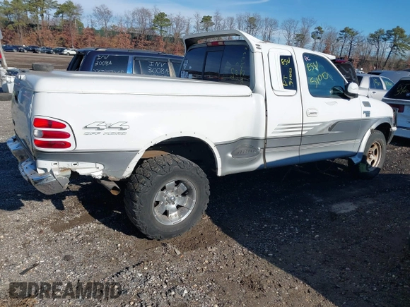 1998 Ford F-150 with VIN 2FTZX08W0WCA98105, listed as a IAAI auction lot 40930475 with Not provided miles and . Bid and sale history available at DreamBid. Image 4.