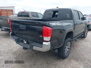 2017 Toyota Tacoma SR5 with VIN 5TFAZ5CN8HX052459, listed as a IAAI auction lot 41495281 with 212,314 mi miles and . Bid and sale history available at DreamBid. Image 4.