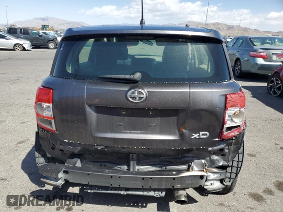 2012 Scion xD z VIN JTKKU4B47C1028244, wystawiony jako Copart lot #54232205 z przebiegiem 99 999 mil mil oraz Tytuł czysty. Historia ofert i sprzedaży dostępna na DreamBid. Obrazek 6.