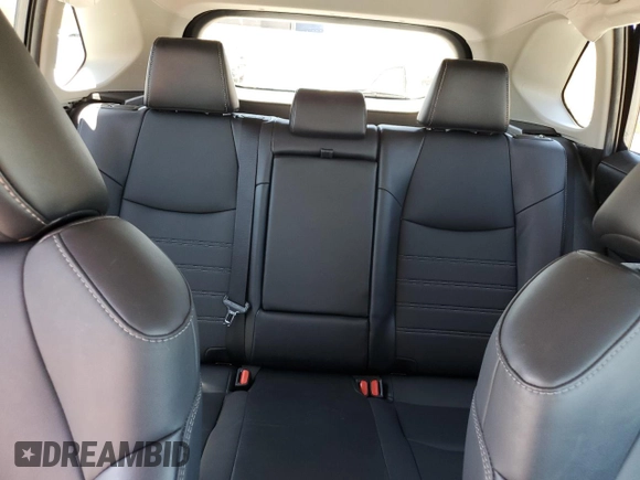 2022 Toyota RAV4 Hybrid XLE Premium z VIN 4T3B6RFV5NU097584, wystawiony jako Copart lot #56163835 z przebiegiem 25 016 mil mil oraz Szkoda całkowita • Salvage title. Historia ofert i sprzedaży dostępna na DreamBid. Obrazek 10.
