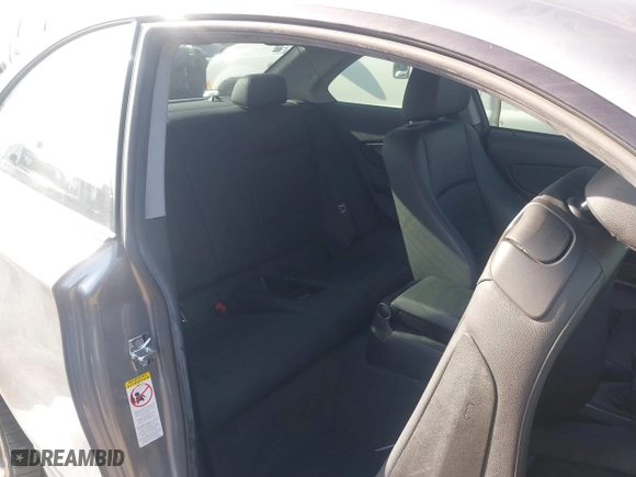 2009 BMW 1 Series 135i with VIN WBAUC73549VK80091, listed as a IAAI auction lot 41228611 with 128,515 mi miles. Bid and sale history available at carsss.com. Image 8.