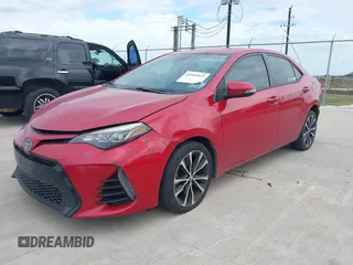 2017 Toyota Corolla L z VIN 5YFBURHE9HP610157, wystawiony jako IAAI lot #40999523 z przebiegiem 185 454 mil mil oraz . Historia ofert i sprzedaży dostępna na DreamBid. Obrazek 2.