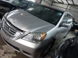2010 Honda Odyssey EX with VIN 5FNRL3H49AB075855, listed as a IAAI auction lot 41748075 with 163,521 mi miles. Bid and sale history available at carsss.com. Image 2.