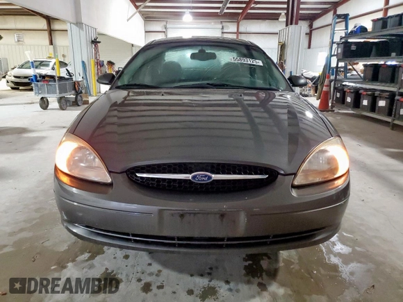 2002 Ford Taurus SES Standard z VIN 1FAFP55U72A161401, wystawiony jako Copart lot #55893125 z przebiegiem 128 258 mil mil oraz Czysty tytuł • Clean title. Historia ofert i sprzedaży dostępna na DreamBid. Obrazek 5.