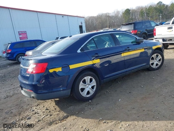 2015 Ford Sedan Police Interceptor with VIN 1FAHP2L88FG126107, listed as a IAAI auction lot 41304337 with 205,164 mi miles. Bid and sale history available at carsss.com. Image 4.
