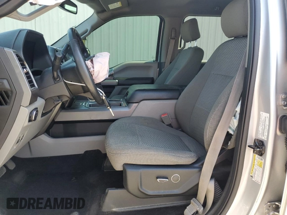 2018 Ford F-150 XL with VIN 1FTEW1EPXJFA95312, listed as a Copart auction lot 57764385 with 91,906 mi miles and Salvage title. Bid and sale history available at DreamBid. Image 7.