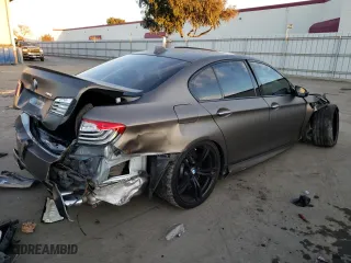 2015 BMW M5 with VIN WBSFV9C5XFD595067, listed as a Copart auction lot 80183913 with 0 mi miles. Bid and sale history available at carsss.com. Image 3.