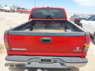 2002 GMC Sierra 1500 SLE z VIN 2GTEC19T121418817, wystawiony jako IAAI lot #42268546 z przebiegiem 337 179 mil mil oraz . Historia ofert i sprzedaży dostępna na DreamBid. Obrazek 17.