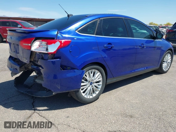 2015 Ford Focus Titanium with VIN 1FADP3J25FL314903, listed as a IAAI auction lot 42053132 with 125,418 mi miles and . Bid and sale history available at carsss.com. Image 4.
