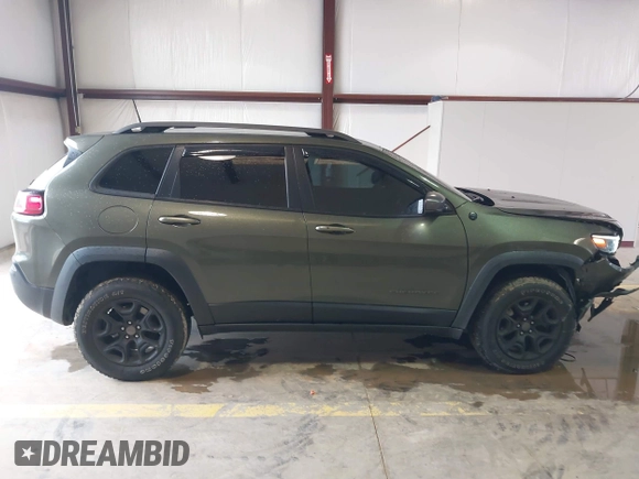 2020 Jeep Cherokee Trailhawk Elite with VIN 1C4PJMBN2LD538076, listed as a IAAI auction lot 42219282 with 53,773 mi miles and . Bid and sale history available at DreamBid. Image 13.