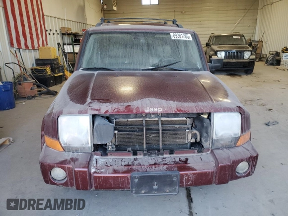 2007 Jeep Commander Limited with VIN 1J8HG582X7C553502, listed as a Copart auction lot 89201285 with 184,233 mi miles and Salvage title. Bid and sale history available at DreamBid. Image 5.