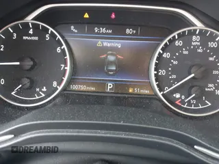 2016 Nissan Maxima Platinum z VIN 1N4AA6AP8GC901079, wystawiony jako IAAI lot #42423396 z przebiegiem 100 750 mil mil oraz . Historia ofert i sprzedaży dostępna na DreamBid. Obrazek 7.