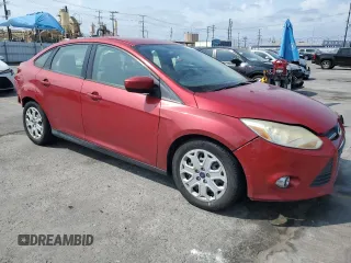2012 Ford Focus SE with VIN 1FAHP3F28CL431445, listed as a Copart auction lot 59562595 with 152,842 mi miles and Salvage title. Bid and sale history available at DreamBid. Image 4.