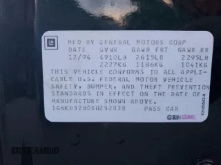 1995 Cadillac DeVille z VIN 1G6KD52B0SU252838, wystawiony jako Copart lot #87642595 z przebiegiem 72 847 mil mil oraz Szkoda całkowita • Salvage title. Historia ofert i sprzedaży dostępna na DreamBid. Obrazek 14.