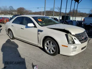 2010 Cadillac STS AWD z VIN 1G6DU6EV0A0101850, wystawiony jako Copart lot #83113264 z przebiegiem 103 491 mil mil oraz Szkoda całkowita • Salvage title. Historia ofert i sprzedaży dostępna na DreamBid. Obrazek 4.