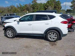 2019 Hyundai Tucson Value with VIN KM8J33A43KU065995, listed as a IAAI auction lot 41720471 with 95,732 mi miles. Bid and sale history available at carsss.com. Image 14.