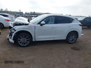 2025 Mazda CX-5 S Premium Plus z VIN JM3KFBEM2S0637206, wystawiony jako IAAI lot #42079234 z przebiegiem 2324 mil mil oraz . Historia ofert i sprzedaży dostępna na DreamBid. Obrazek 15.