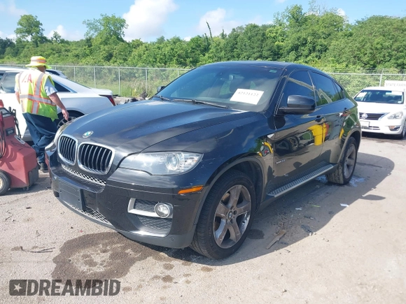 2014 BMW X6 xDrive35i with VIN 5UXFG2C5XE0C43526, listed as a IAAI auction lot 42121122 with 199,564 mi miles. Bid and sale history available at carsss.com. Image 2.