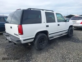 1997 Chevrolet Tahoe with VIN 1GNEK13R7VJ324524, listed as a IAAI auction lot 41623104 with 268,178 mi miles. Bid and sale history available at carsss.com. Image 4.
