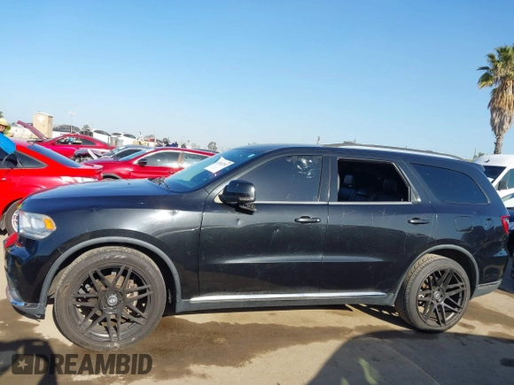 2015 Dodge Durango Limited with VIN 1C4RDHDG0FC200823, listed as a IAAI auction lot 42262387 with 127,442 mi miles and . Bid and sale history available at DreamBid. Image 14.