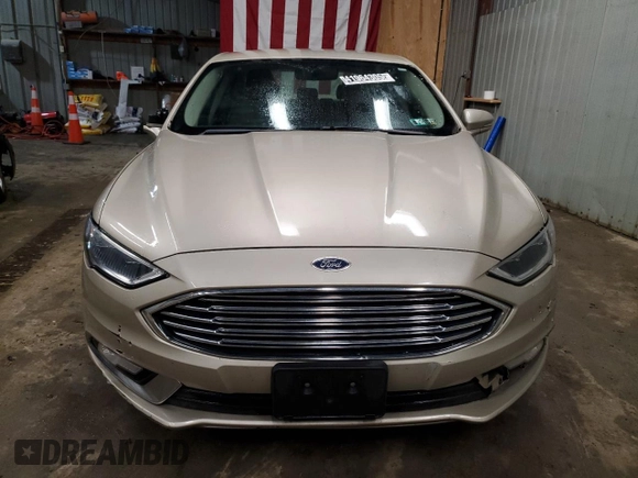 2017 Ford Fusion SE z VIN 3FA6P0HD0HR120234, wystawiony jako Copart lot #41964305 z przebiegiem 114 200 mil mil oraz Czysty tytuł • Clean title. Historia ofert i sprzedaży dostępna na DreamBid. Obrazek 5.
