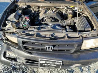 1998 Honda Passport LX with VIN 4S6CM58W7W4419247, listed as a Copart auction lot 88231175 with 194,105 mi miles and Salvage Title. Bid and sale history available at carsss.com. Image 12.