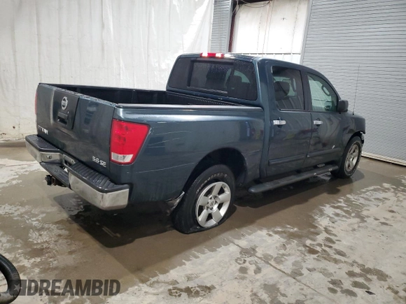2006 Nissan Titan XE with VIN 1N6BA07AX6N548973, listed as a Copart auction lot 83428574 with 201,887 mi miles and Salvage title. Bid and sale history available at DreamBid. Image 3.