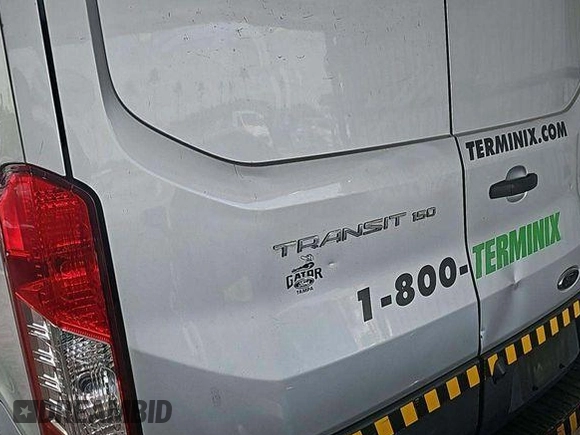 2017 Ford Transit Cargo z VIN 1FTYE1CMXHKA48291, wystawiony jako IAAI lot #42731289 z przebiegiem 142 973 mil mil oraz . Historia ofert i sprzedaży dostępna na DreamBid. Obrazek 30.