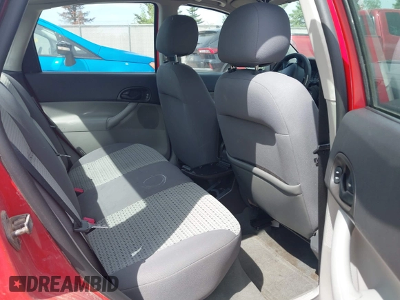 2007 Ford Focus S z VIN 1FAFP34N17W299881, wystawiony jako IAAI lot #42282442 z przebiegiem 144 782 mil mil oraz . Historia ofert i sprzedaży dostępna na DreamBid. Obrazek 8.