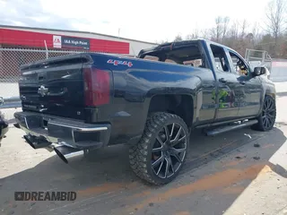 2017 Chevrolet Silverado 1500 LT with VIN 1GCVKREC9HZ255048, listed as a IAAI auction lot 41727476 with Not Provided miles and . Bid and sale history available at DreamBid. Image 4.