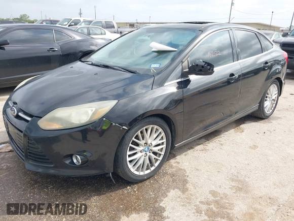 2013 Ford Focus Titanium with VIN 1FADP3J23DL152122, listed as a IAAI auction lot 41935180 with 175,065 mi miles and . Bid and sale history available at carsss.com. Image 2.