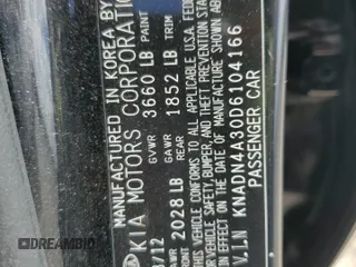 2013 Kia Rio EX with VIN KNADN4A30D6104166, listed as a Copart auction lot 56752345 with 129,708 mi miles and Salvage title. Bid and sale history available at DreamBid. Image 12.