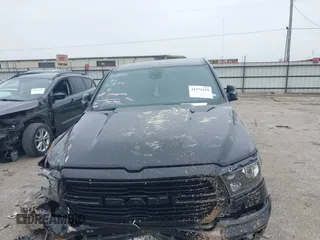 2021 Ram 1500 Big Horn z VIN 1C6RREFG7MN630189, wystawiony jako IAAI lot #41371219 z przebiegiem 62 613 mil mil oraz . Historia ofert i sprzedaży dostępna na DreamBid. Obrazek 11.