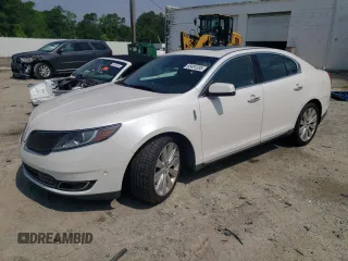 2013 Lincoln MKS EcoBoost z VIN 1LNHL9FT5DG616544, wystawiony jako Copart lot #55491335 z przebiegiem 114 219 mil mil oraz Szkoda całkowita • Salvage title. Historia ofert i sprzedaży dostępna na DreamBid. Obrazek 1.