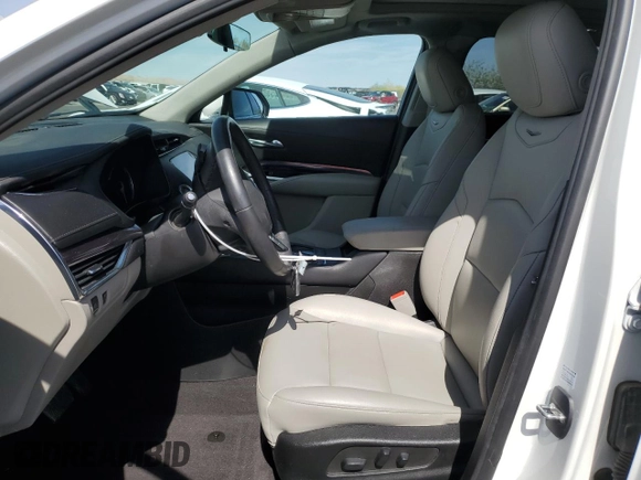 2023 Cadillac XT4 FWD Luxury with VIN 1GYAZAR46PF134602, listed as a Copart auction lot 54684865 with 13,221 mi miles and Salvage title. Bid and sale history available at DreamBid. Image 7.