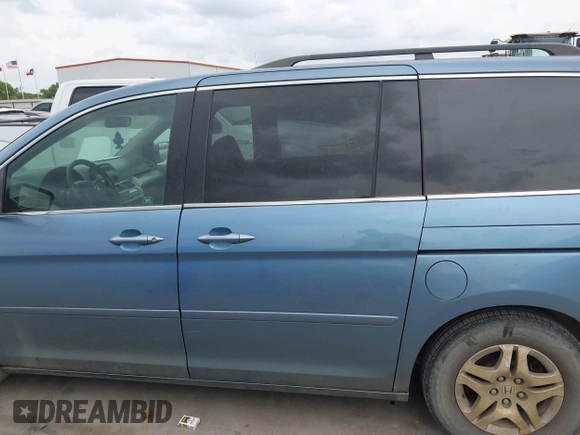 2007 Honda Odyssey EX-L with VIN 5FNRL38717B127157, listed as a IAAI auction lot 41890838 with 195,241 mi miles and . Bid and sale history available at DreamBid. Image 14.
