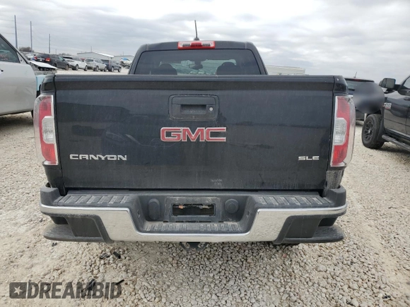 2020 GMC Canyon 2WD SLE with VIN 1GTH5CEA9L1137590, listed as a Copart auction lot 87305534 with 0 mi miles and Salvage Title. Bid and sale history available at carsss.com. Image 6.