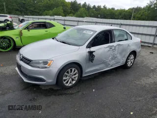 2013 Volkswagen Jetta SE with VIN 3VWDP7AJ0DM268947, listed as a Copart auction lot 58822335 with 106,938 mi miles and Salvage title. Bid and sale history available at DreamBid. Image 1.