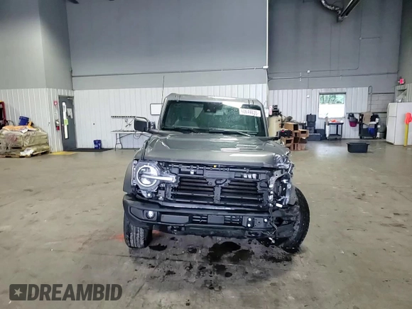 2023 Ford Bronco z VIN 1FMDE5AH9PLB83620, wystawiony jako Copart lot #60644035 z przebiegiem 6 700 mil mil oraz Szkoda całkowita • Salvage title. Historia ofert i sprzedaży dostępna na DreamBid. Obrazek 14.