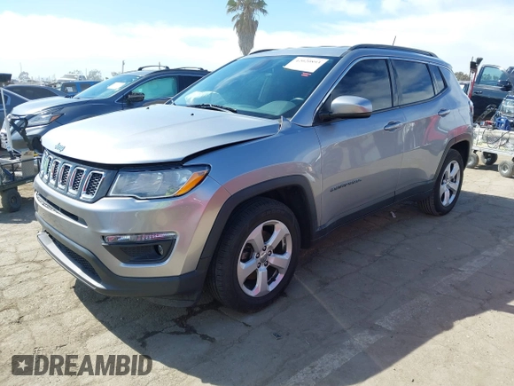 2019 Jeep Compass Latitude with VIN 3C4NJCBB0KT676974, listed as a IAAI auction lot 42020893 with 54,159 mi miles and . Bid and sale history available at DreamBid. Image 2.